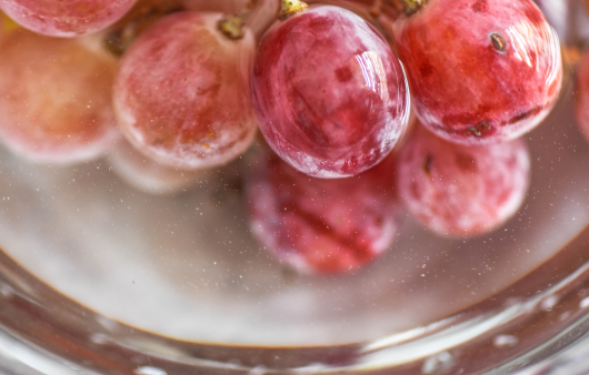 Grapes are soaked in water to wash away dirt and debris from the inside of the bunches |  Source: Getty Image Bank